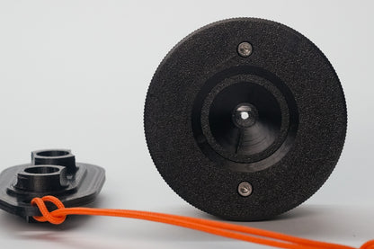 Close-up of blemished black Brick focus ring and Sony E mount base